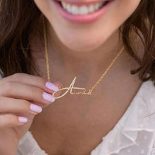 The Signature Style Silver Name Necklace with Diamond featuring a personalized script design, a zircon-adorned initial, and an elegant slim chain.

