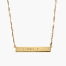 A Personalized Silver Plate Necklace featuring a sleek bar pendant with cubic zirconia accents, customizable, and packaged in a luxury Jewel Flairs box.

