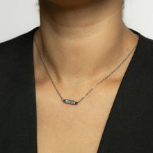 Love Yourself First Necklace in Silver with Arabic and English engravings, worn at 18 inches.

