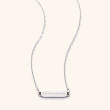 Love Yourself First Necklace in Silver with Arabic and English engravings, worn at 18 inches.

