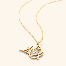 A silver necklace featuring a ready-made popular name in elegant Arabic calligraphy, crafted with artistic precision.

