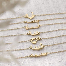 An elegant Arabic Name Silver Necklace featuring a delicate script pendant on a sleek cable chain, packaged in a luxury Jewel Flairs box.

