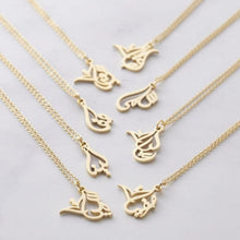 A silver necklace featuring a ready-made popular name in elegant Arabic calligraphy, crafted with artistic precision.

