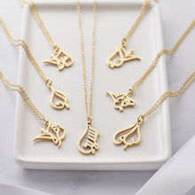 A silver necklace featuring a ready-made popular name in elegant Arabic calligraphy, crafted with artistic precision.

