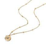 Dainty initial 'A' disc necklace with a satellite bead chain in 18k gold-plated sterling silver, shown against a neutral background.