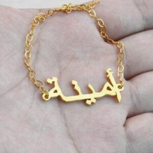 Personalized 'Amanda' name necklace in 18k gold-plated sterling silver, hanging from a delicate chain on a neutral background.