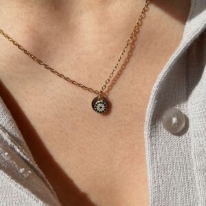 Personalized Evil Eye and Initial 'A' charm necklace in 18k gold-plated sterling silver, showing both charms on a delicate chain.