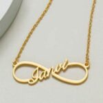 Personalized 'Emily' infinity name necklace in 18k gold-plated sterling silver, showing the name integrated into the timeless symbol.