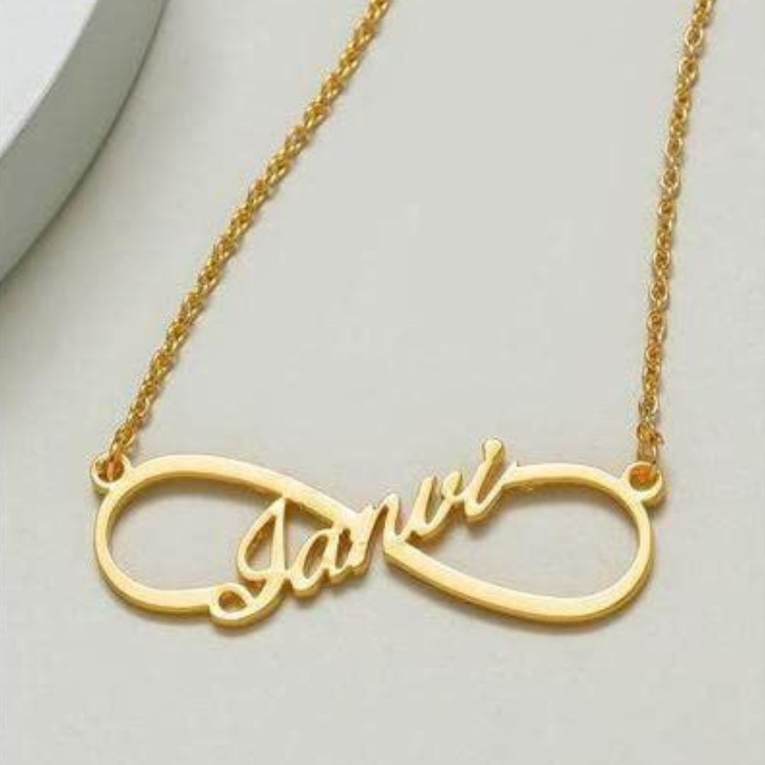 Personalized 'Emily' infinity name necklace in 18k gold-plated sterling silver, showing the name integrated into the timeless symbol.