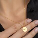 Personalized 'Jessica' oval frame name necklace in 18k rose gold-plated sterling silver, showing the pendant on a delicate chain.