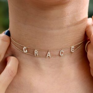 Gothic name choker with the name 'Aria' in Old English script, made from 18k gold-plated sterling silver.