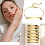 A personalized 'Chloe' bar bracelet in 18k gold-plated sterling silver, showing the engraved name and sparkling crystal accent.