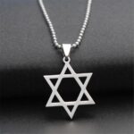 Celestial Hollow Star Necklace in antiqued sterling silver, showing the large, open-star pendant with its vintage-style oxidized finish.
