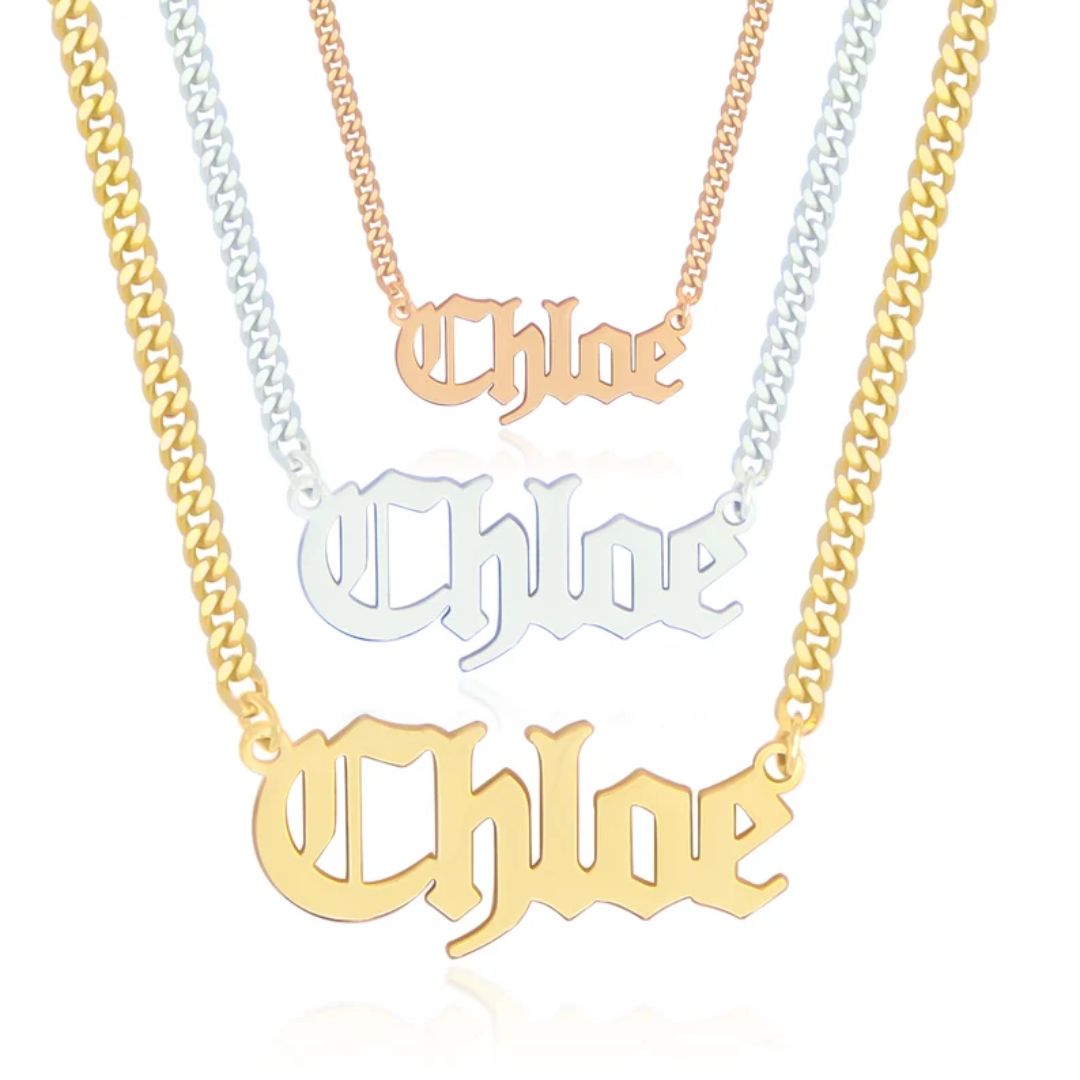 Gothic name necklace with the name 'Lilith' in Old English script, made from 18k rose gold-plated sterling silver on a curb chain.