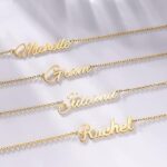 Dainty 'Sophia' name bracelet in 18k gold-plated sterling silver, worn on a woman's wrist.