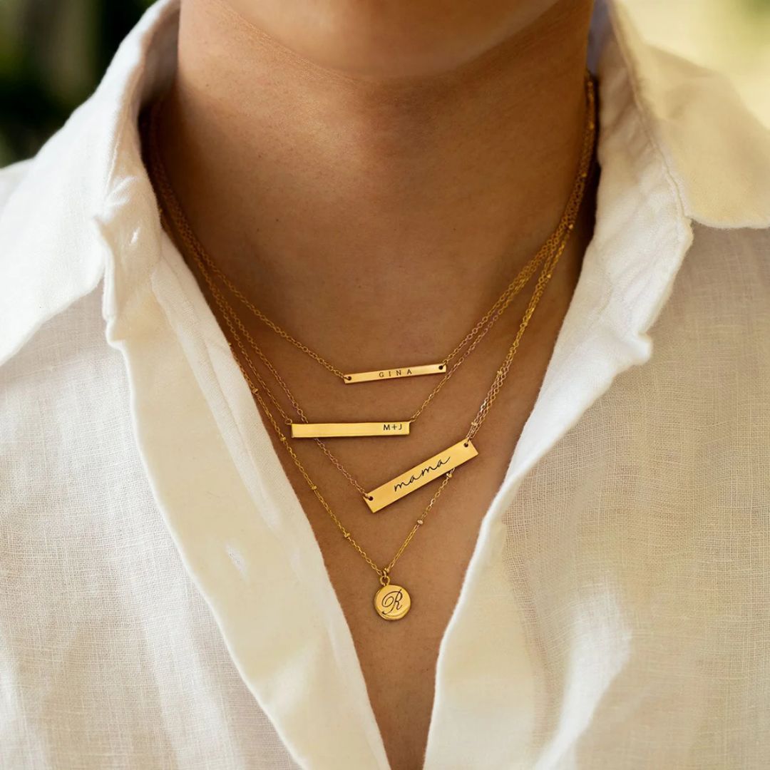 Dainty initial 'A' disc necklace with a satellite bead chain in 18k gold-plated sterling silver, shown against a neutral background.