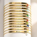 A personalized 'Chloe' bar bracelet in 18k gold-plated sterling silver, showing the engraved name and sparkling crystal accent.