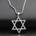 Celestial Hollow Star Necklace in antiqued sterling silver, showing the large, open-star pendant with its vintage-style oxidized finish.
