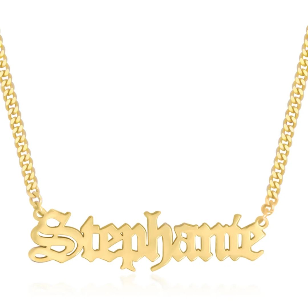 Gothic name necklace with the name 'Lilith' in Old English script, made from 18k rose gold-plated sterling silver on a curb chain.