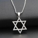 Celestial Hollow Star Necklace in antiqued sterling silver, showing the large, open-star pendant with its vintage-style oxidized finish.