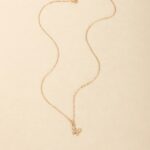 Graceful butterfly pendant necklace in 18k gold-plated sterling silver, showing the delicate charm on a fine chain.