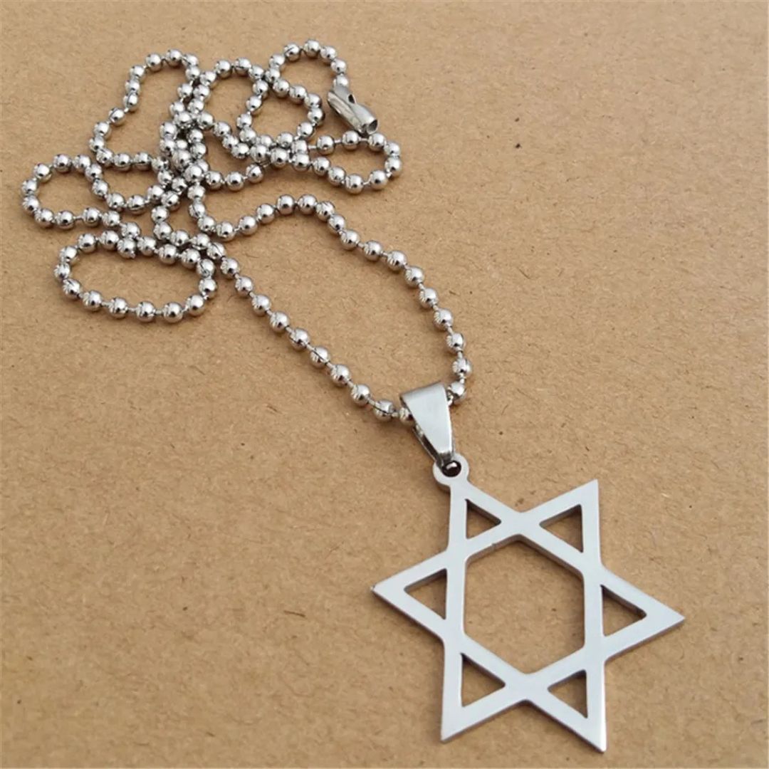 Celestial Hollow Star Necklace in antiqued sterling silver, showing the large, open-star pendant with its vintage-style oxidized finish.