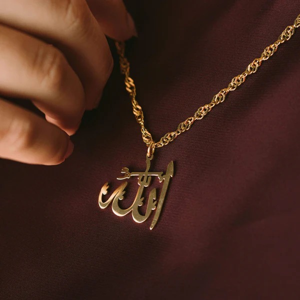 Allah calligraphy medallion necklace in 18k gold-plated sterling silver, showcasing the artistic script of "Allah" on the round pendant.
