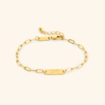 'Ukhti' Arabic calligraphy sister link bracelet in 18k gold-plated sterling silver, shown on a woman's wrist.