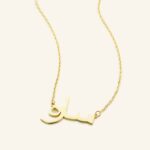 A personalized 'Jessica' name necklace in 18k gold-plated sterling silver, hanging from a delicate chain on a neutral background.