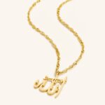 Allah calligraphy medallion necklace in 18k gold-plated sterling silver, showcasing the artistic script of "Allah" on the round pendant.