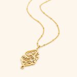 "I Am Near" Quranic verse bar necklace in 18k gold-plated sterling silver, showing the delicate Arabic calligraphy on the vertical pendant.